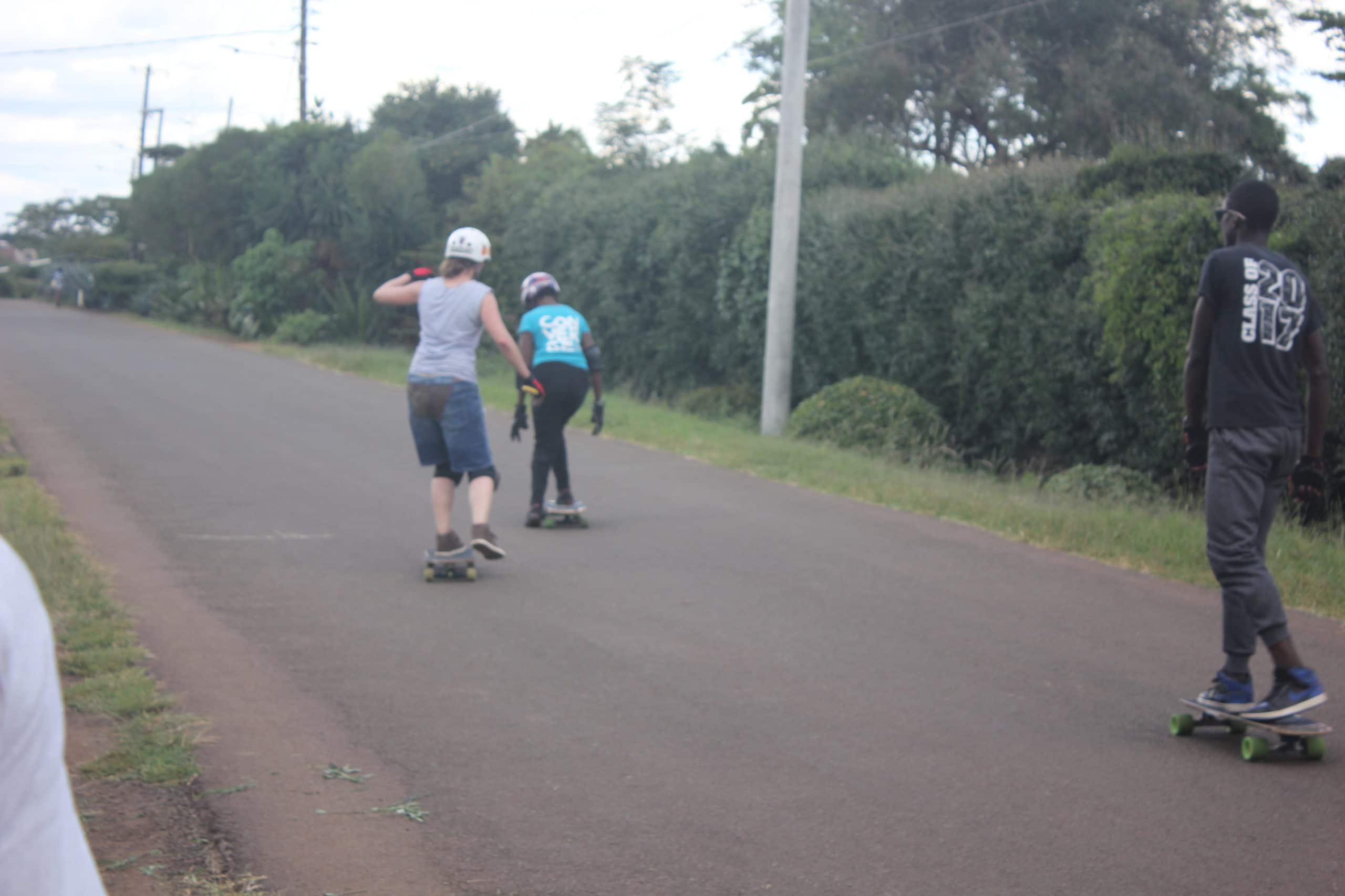 Christa (a Kenyan longboard) learning to skate