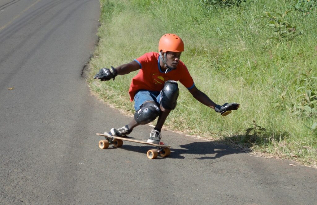 downhill skater with protective gear