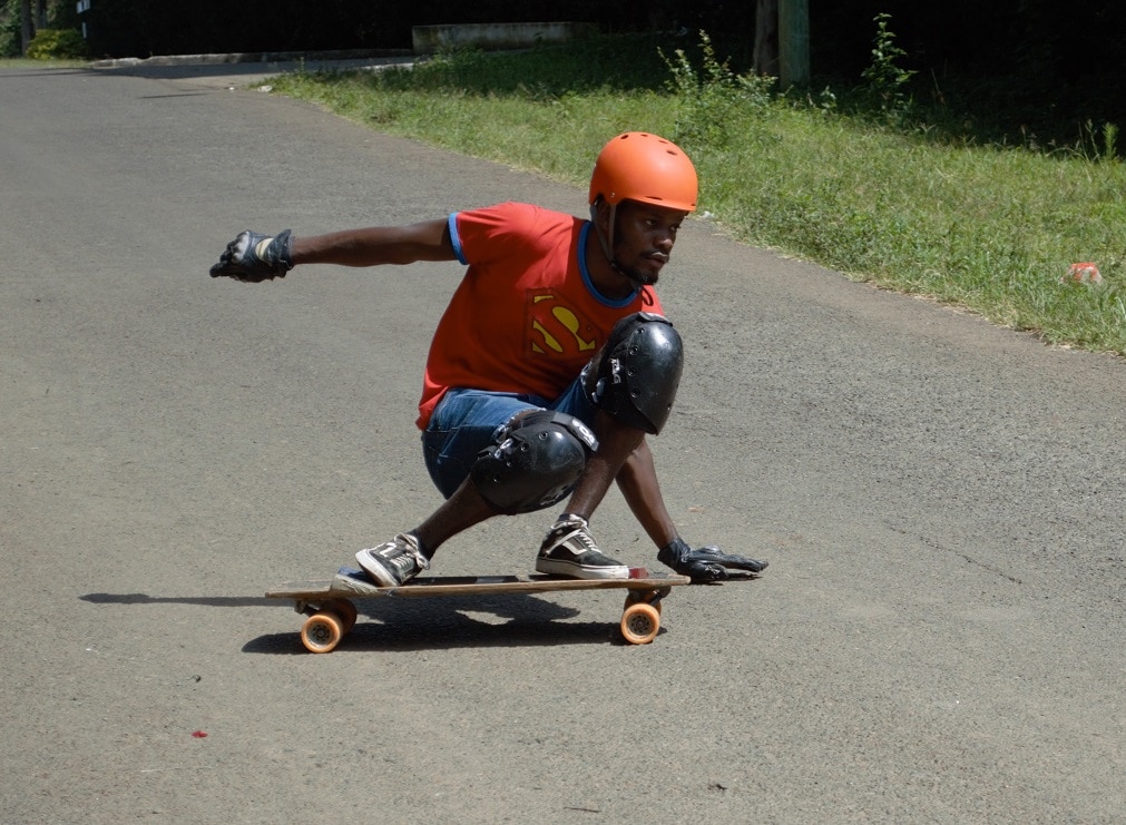 longboarding sessioning a corner